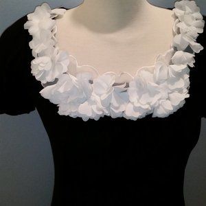 J'Adore black dress with applied white flower neckline